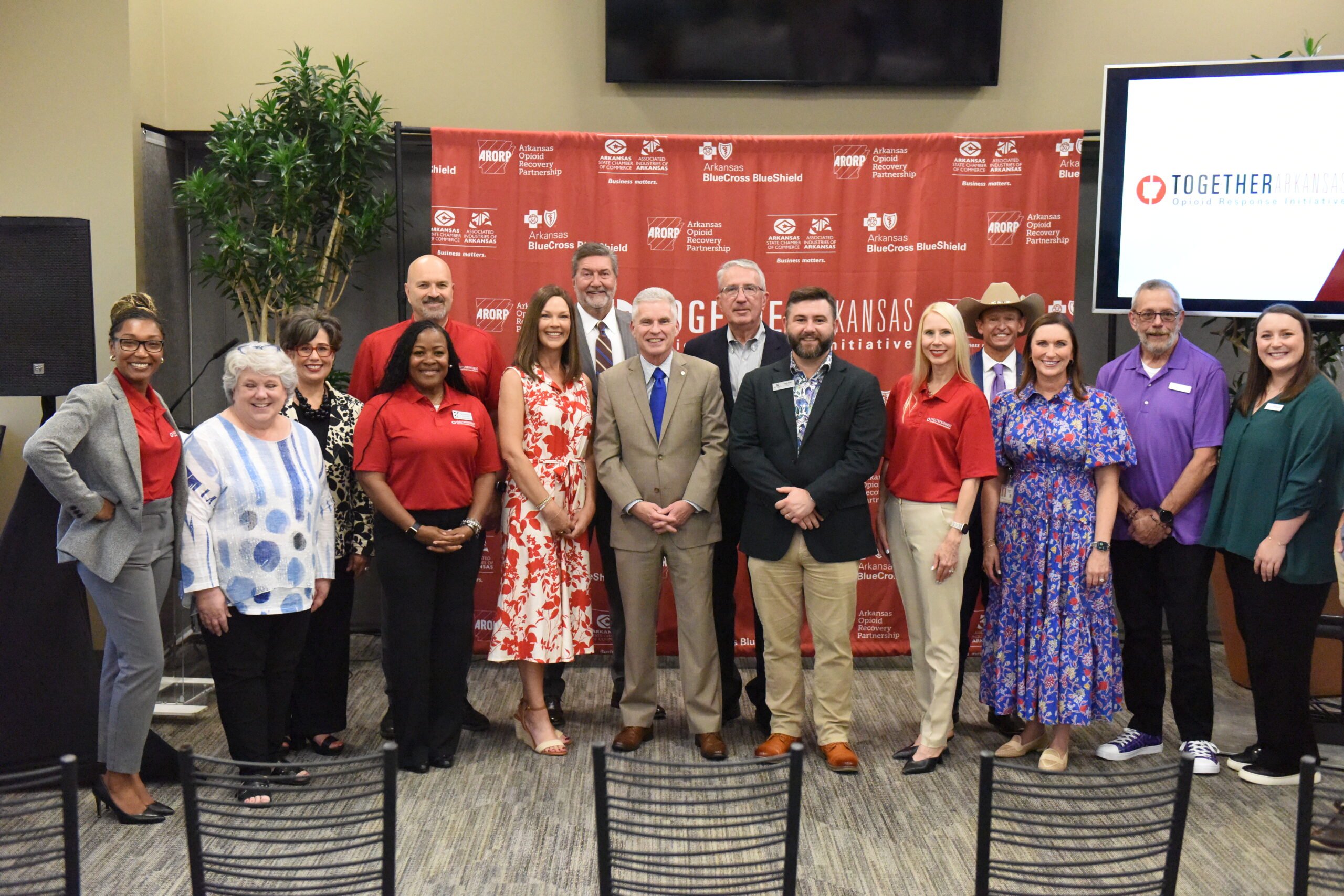 Group of various members at the Together Arkansas relaunch event.